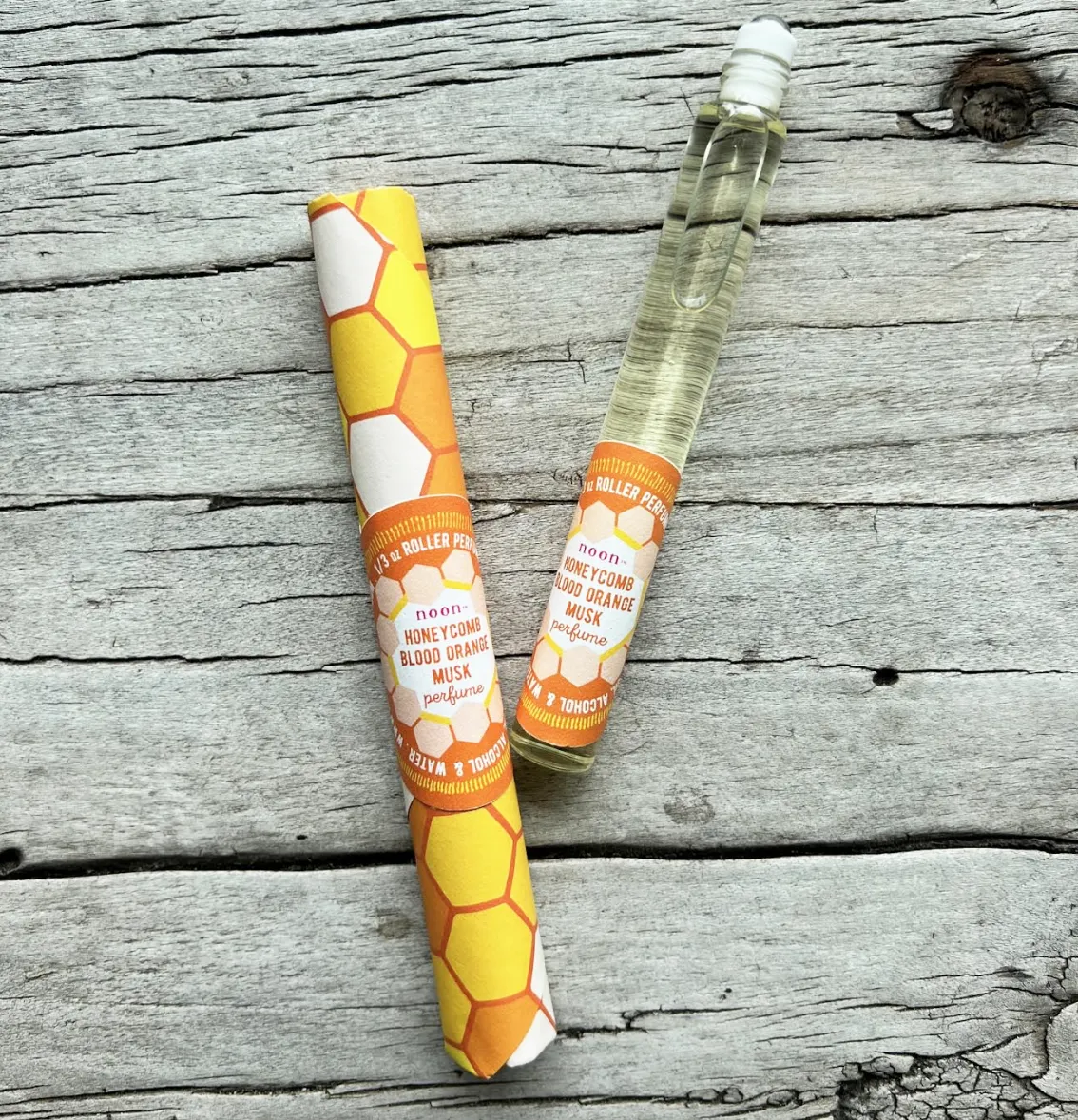 rollerball perfume . honeycomb, blood orange and Egyptian musk